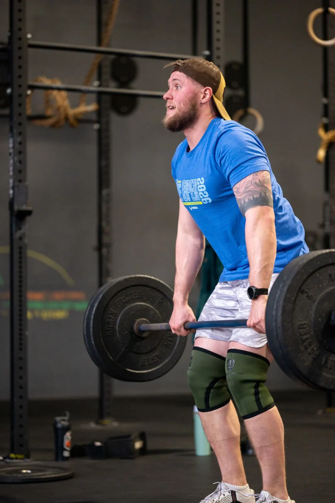 A member locking out a deadlift