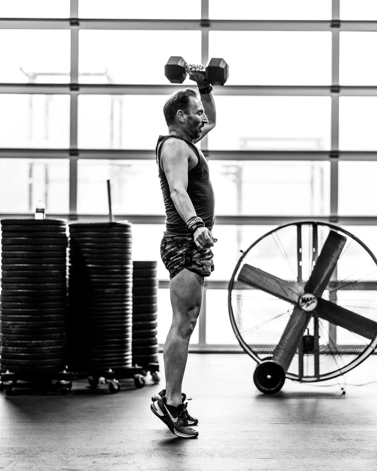 Dumbbell work in front of the bay window
